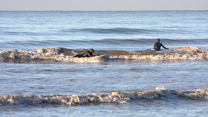 Surfing photos of west pier tiny